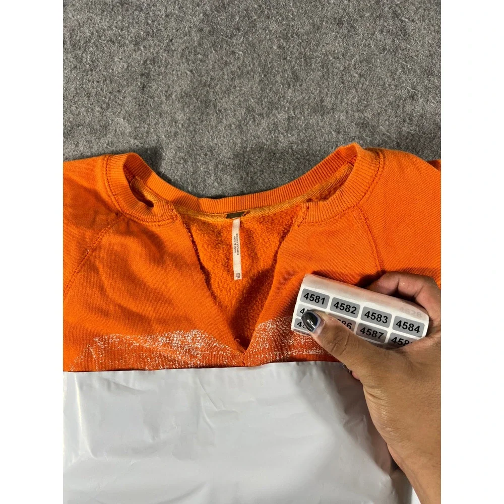 Free People Sweatshirt Womens XS Orange Fleece Lined Graphic Pullover Oversized